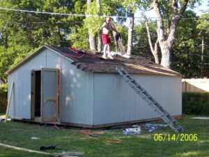 Roof sheathed, tar-papered, and shingling begun 