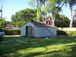 Roof sheathed, tar-papered, and shingling begun 