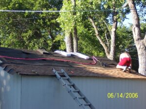 Roof sheathed, tar-papered, and shingling begun 